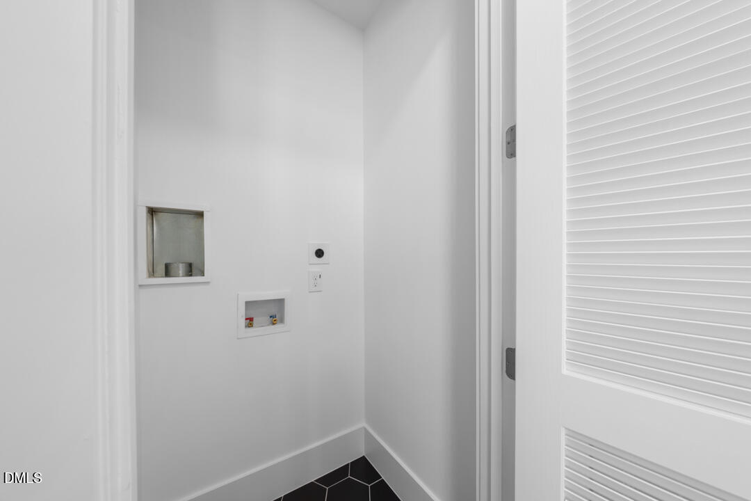 2530 West Wilson Street Durham, NC 27705 - Photo 29 of 49 a small space with wooden floor and a window