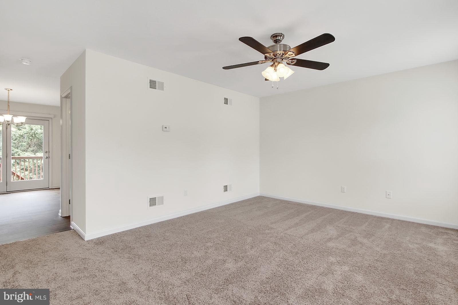 17 Grace Avenue Hanover, PA 17331 - Photo 5 of 13 an empty room with window and ceiling fan