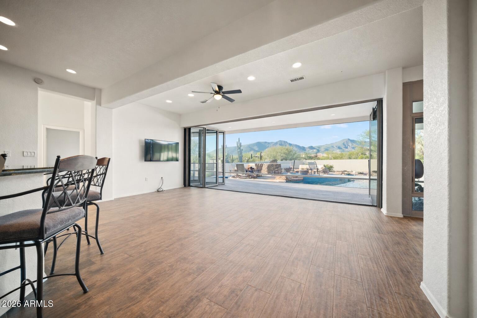 5894 East Hidden Springs Road Cave Creek, AZ 85331 - Photo 5 of 36 Staged sliding door from kitchen