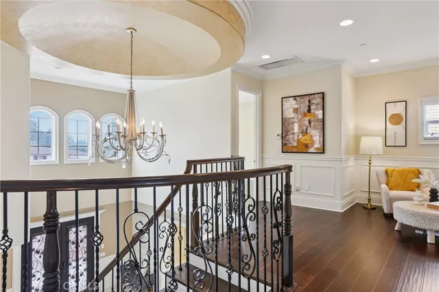 a bathroom with a granite countertop sink a mirror and a bathtub