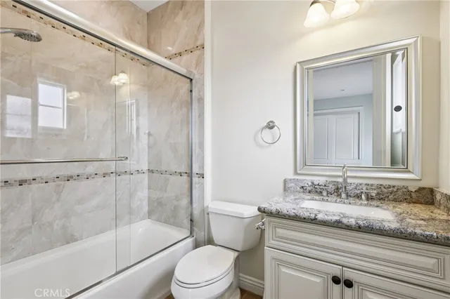 a aerial view of a house with a yard