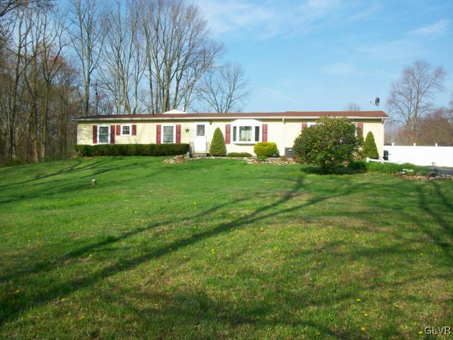 1049 Deemer Road Bath, PA 18014 - Photo 1 of 13 front view of house with a yard