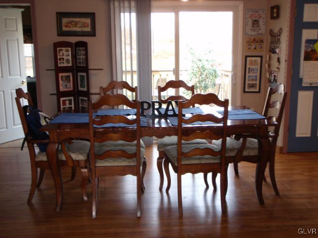 1049 Deemer Road Bath, PA 18014 - Photo 2 of 13 a view of a dining room with furniture and wooden floor