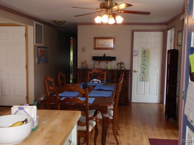 1049 Deemer Road Bath, PA 18014 - Photo 4 of 13 a view of a dining room with furniture and wooden floor