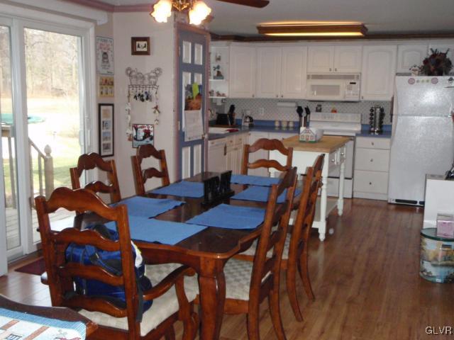 1049 Deemer Road Bath, PA 18014 - Photo 6 of 13 a view of a dining room with furniture and wooden floor