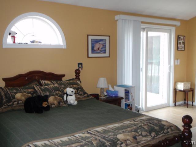 1049 Deemer Road Bath, PA 18014 - Photo 8 of 13 a bedroom with a bed and a window