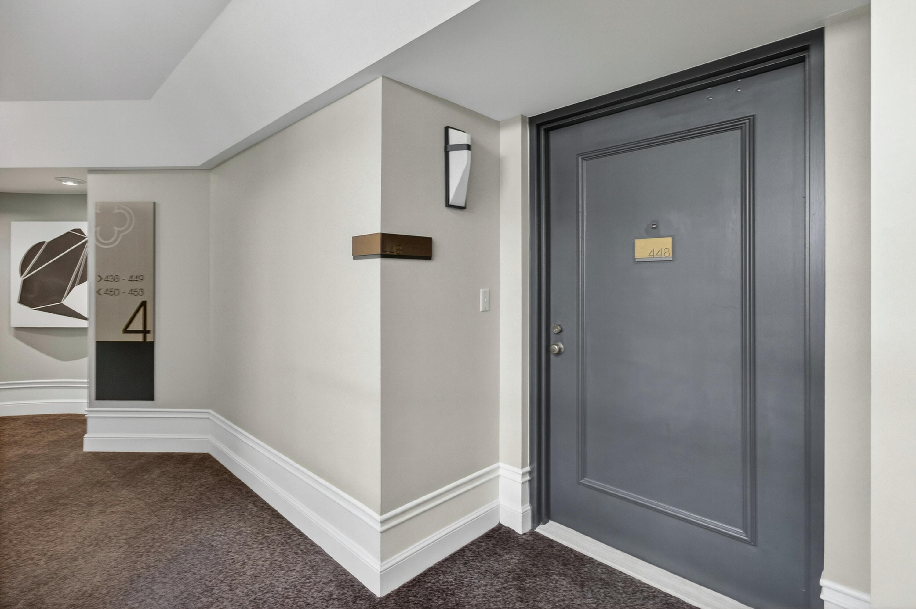 140 Southeast 5th Avenue, Unit 448 Boca Raton, FL 33432 - Photo 5 of 43 a view of a hallway with closet