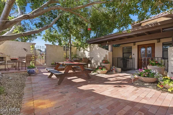 a view of a workspace with furniture