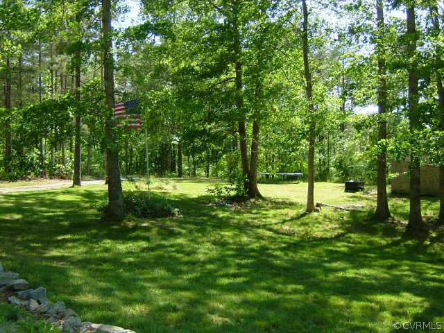 650 Edgar Road Hanover, VA 23069 - Photo 2 of 10 a view of a backyard with trees