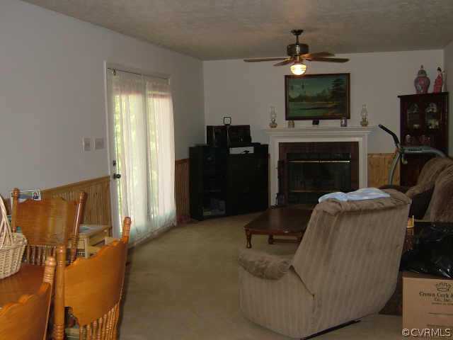 650 Edgar Road Hanover, VA 23069 - Photo 6 of 10 a living room with furniture and a flat screen tv