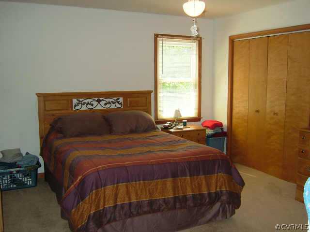 650 Edgar Road Hanover, VA 23069 - Photo 9 of 10 a bedroom with a bed and a window