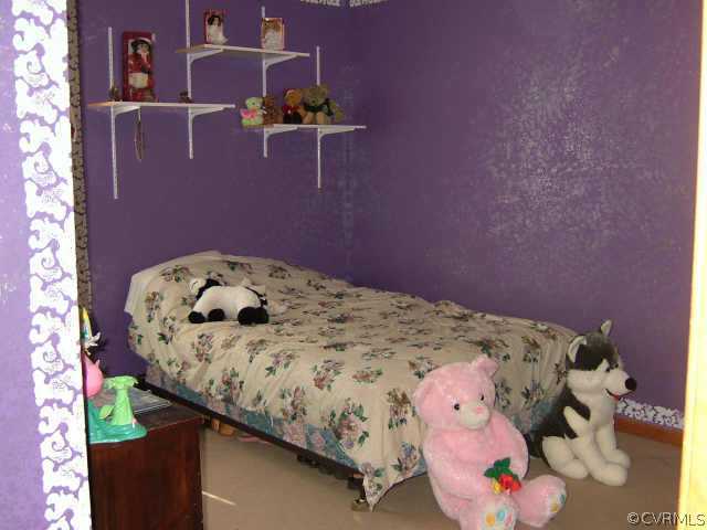 650 Edgar Road Hanover, VA 23069 - Photo 10 of 10 a bedroom with a bed and a table