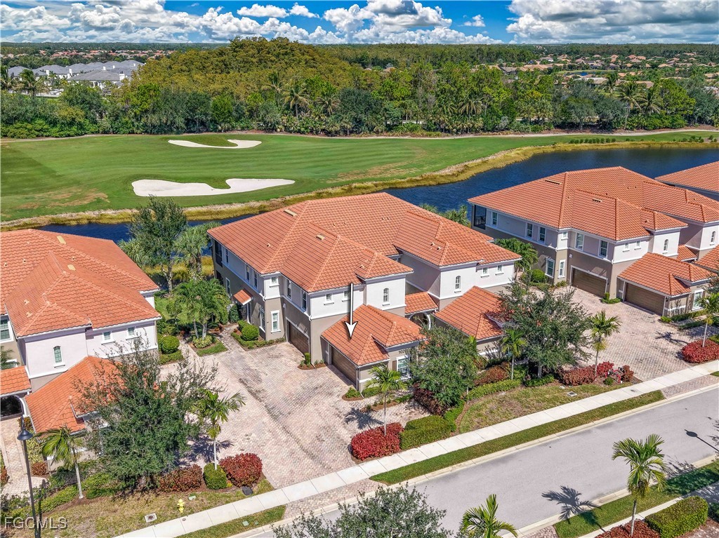 an aerial view of a house with a garden