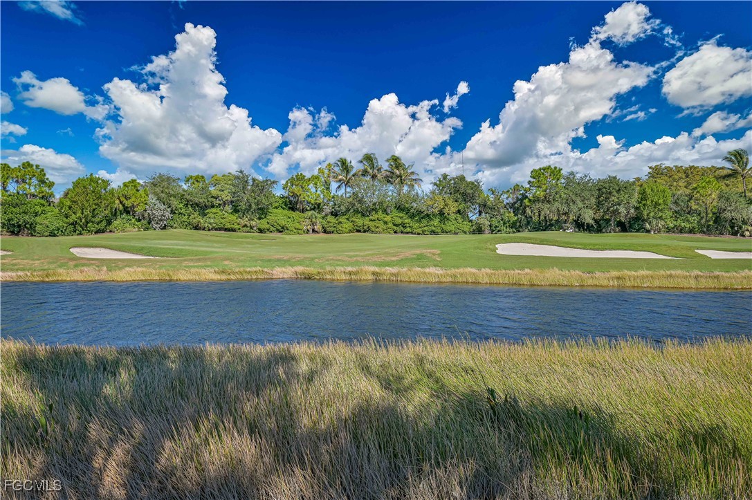 10251 Glastonbury Circle, Unit 201 Fort Myers, FL 33913 - Photo 24 of 45 a view of an outdoor space and a lake view