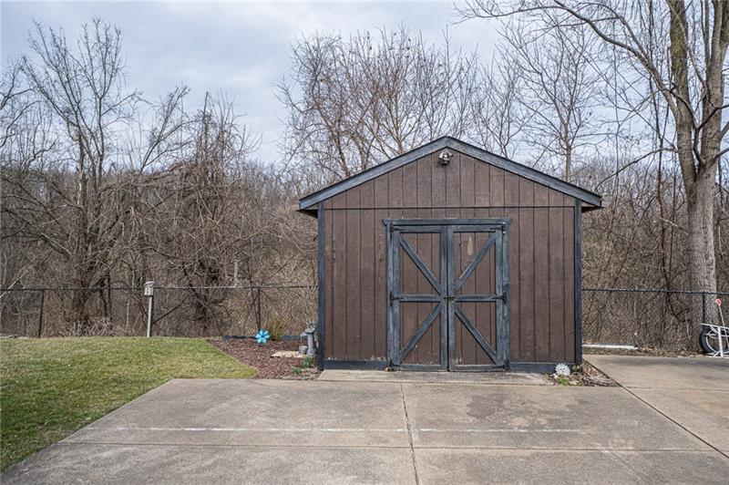 37 Quail Hill Road Pittsburgh, PA 15214 - Photo 23 of 24 STORAGE SHED IN PRIVATE TREE LINED BACK YARD
