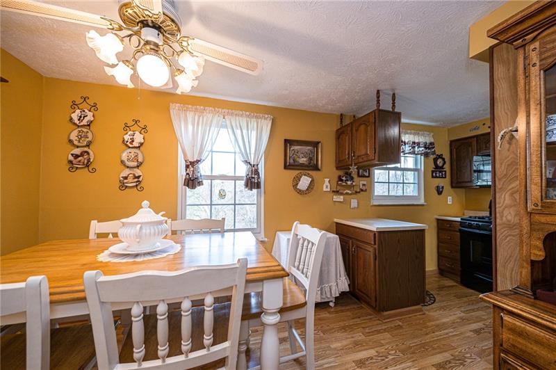 37 Quail Hill Road Pittsburgh, PA 15214 - Photo 9 of 24 CEILING FAN IN KITCHEN AREA