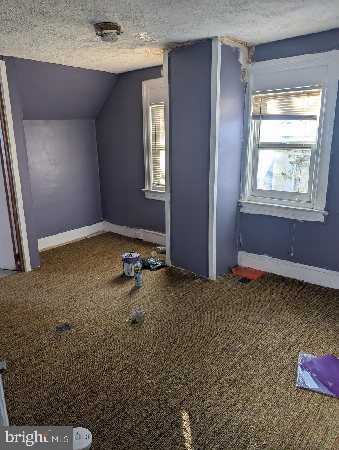 78 Blackwood Road Clementon, NJ 08021 - Photo 5 of 6 a view of a hardwood floor and window in an empty room