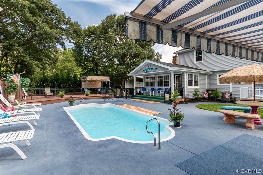 4500 Crossgate Road Chester, VA 23831 - Photo 8 of 50 a view of a house with pool and chairs