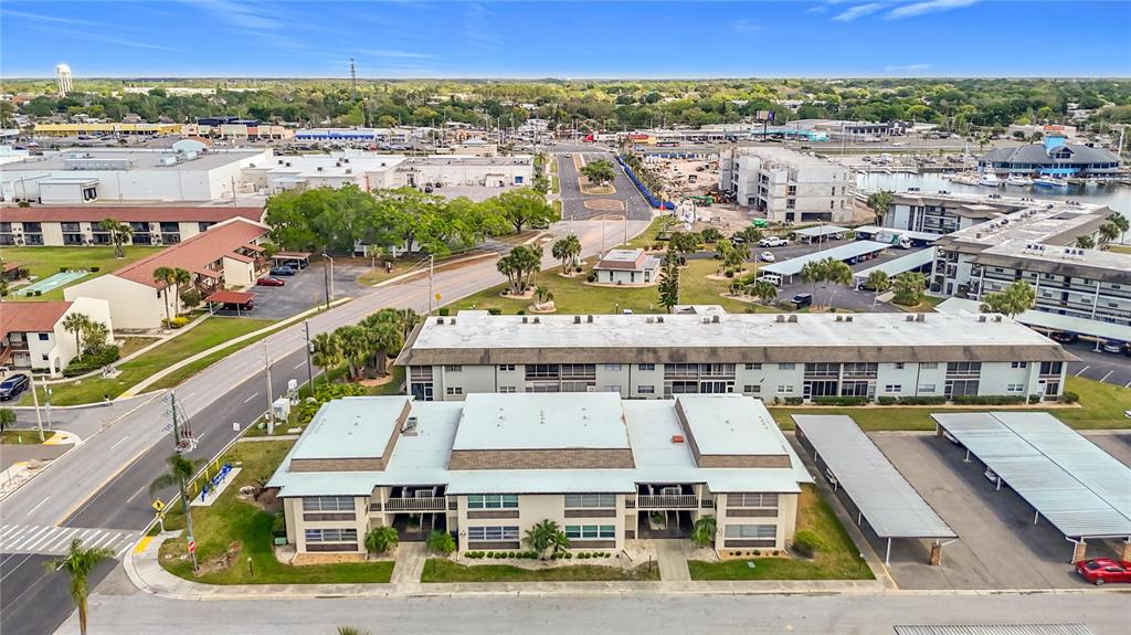 5132 Amulet Drive, Unit 105 New Port Richey, FL 34652 - Photo 41 of 42 a view of a city with lawn chairs