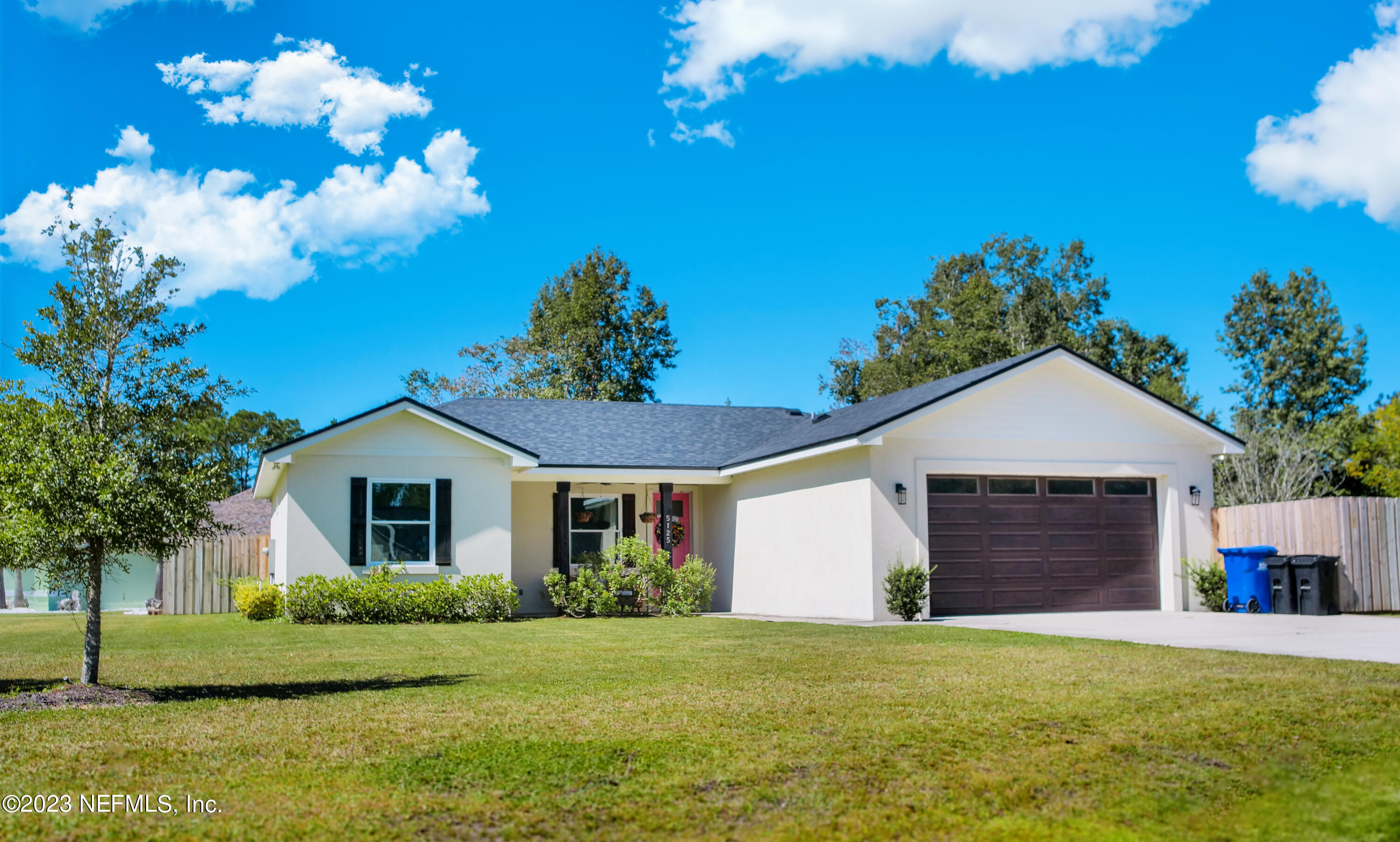 5125 Gracewood Lane St. Augustine, FL 32092 - Photo 21 of 21 a front view of a house with garden