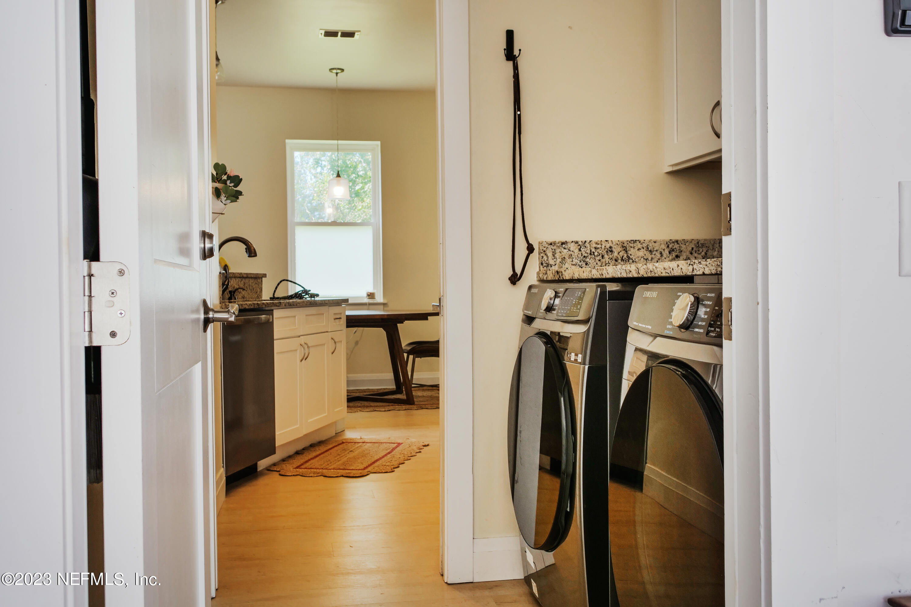 5125 Gracewood Lane St. Augustine, FL 32092 - Photo 8 of 21 a view of a kitchen with a sink washer and dryer