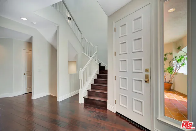 wooden floor view of an entryway with wooden floor