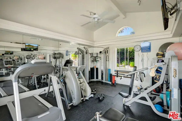 a view of a room with gym equipment