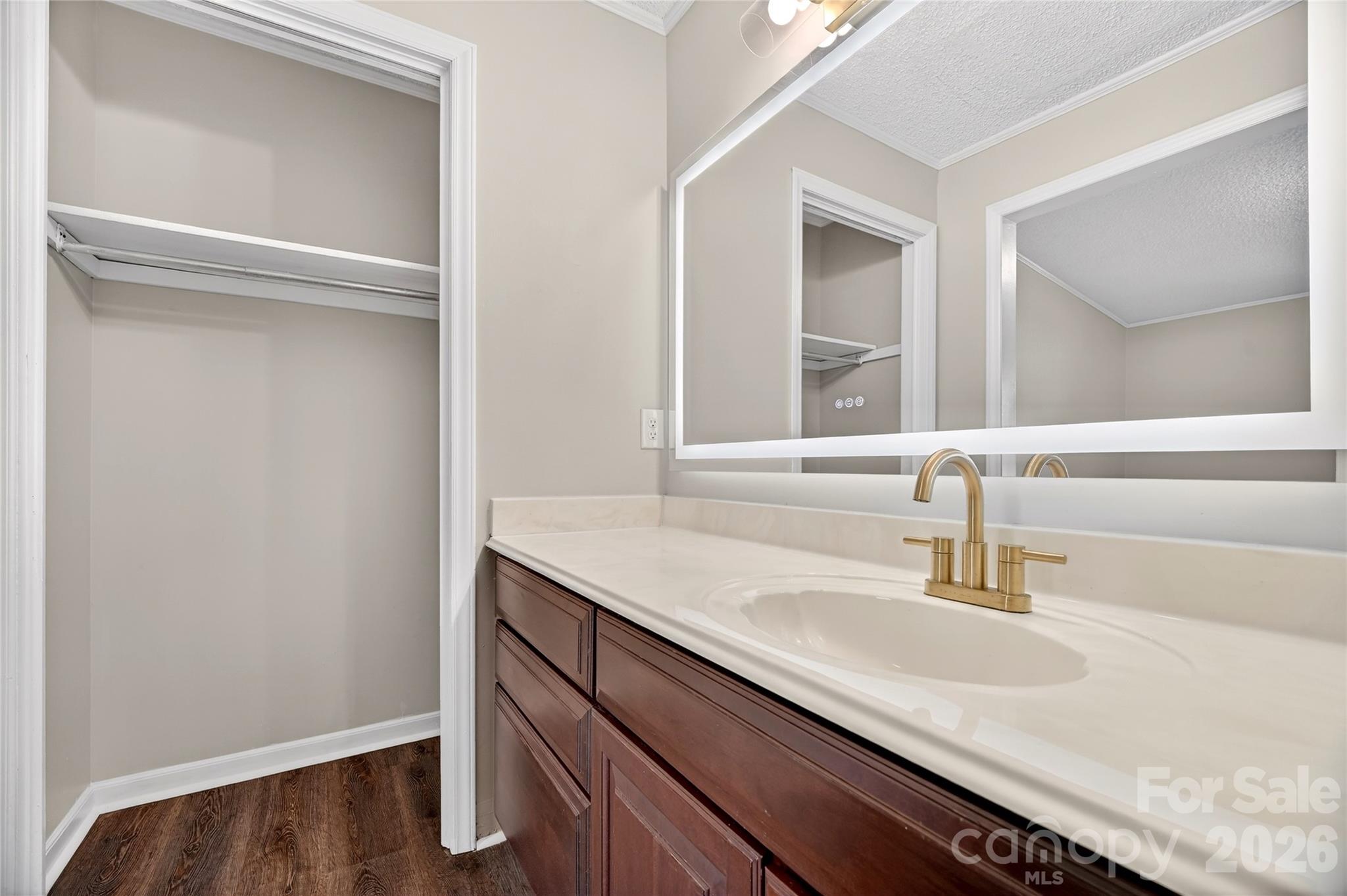 1919 Oak Hollow Road Gastonia, NC 28054 - Photo 20 of 36 a bathroom with a sink and a mirror
