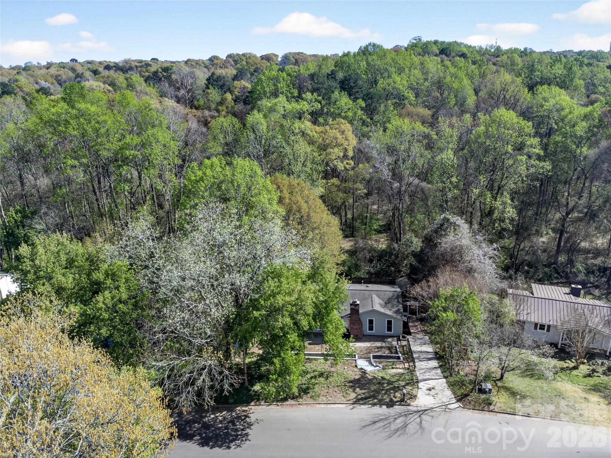 1919 Oak Hollow Road Gastonia, NC 28054 - Photo 32 of 36 an aerial view of a house with yard and outdoor seating
