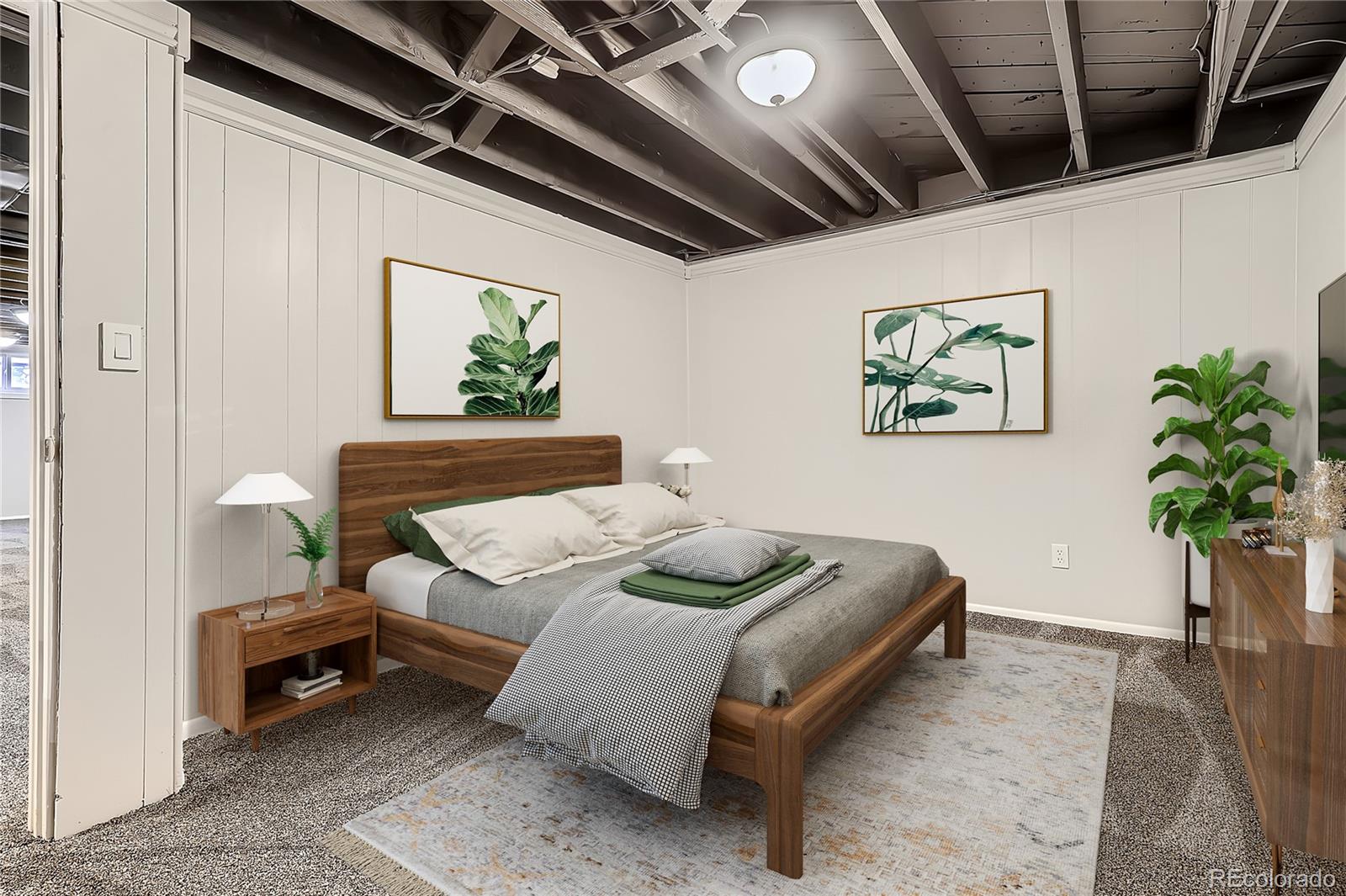 6930 North Locust Street Commerce City, CO 80022 - Photo 12 of 17 a bed sitting in a bedroom next to a window