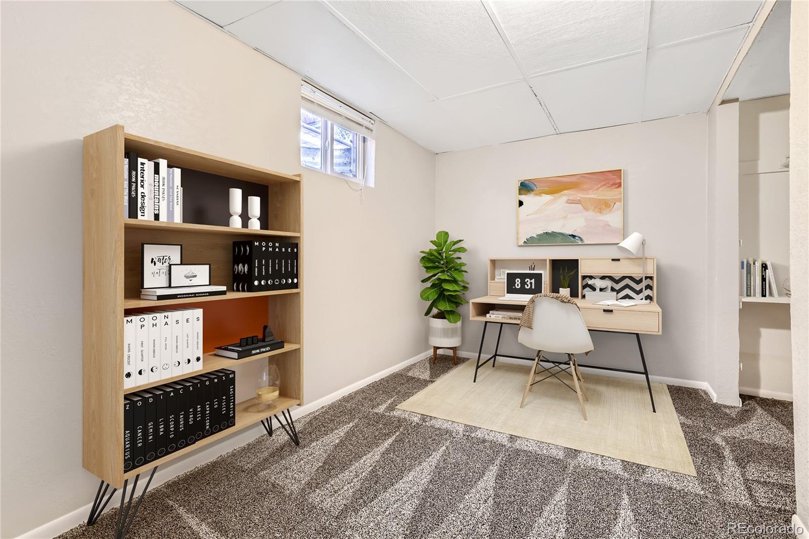 6930 North Locust Street Commerce City, CO 80022 - Photo 13 of 17 a room with furniture