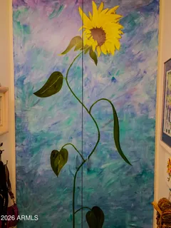 a view of a patio with a table and chairs