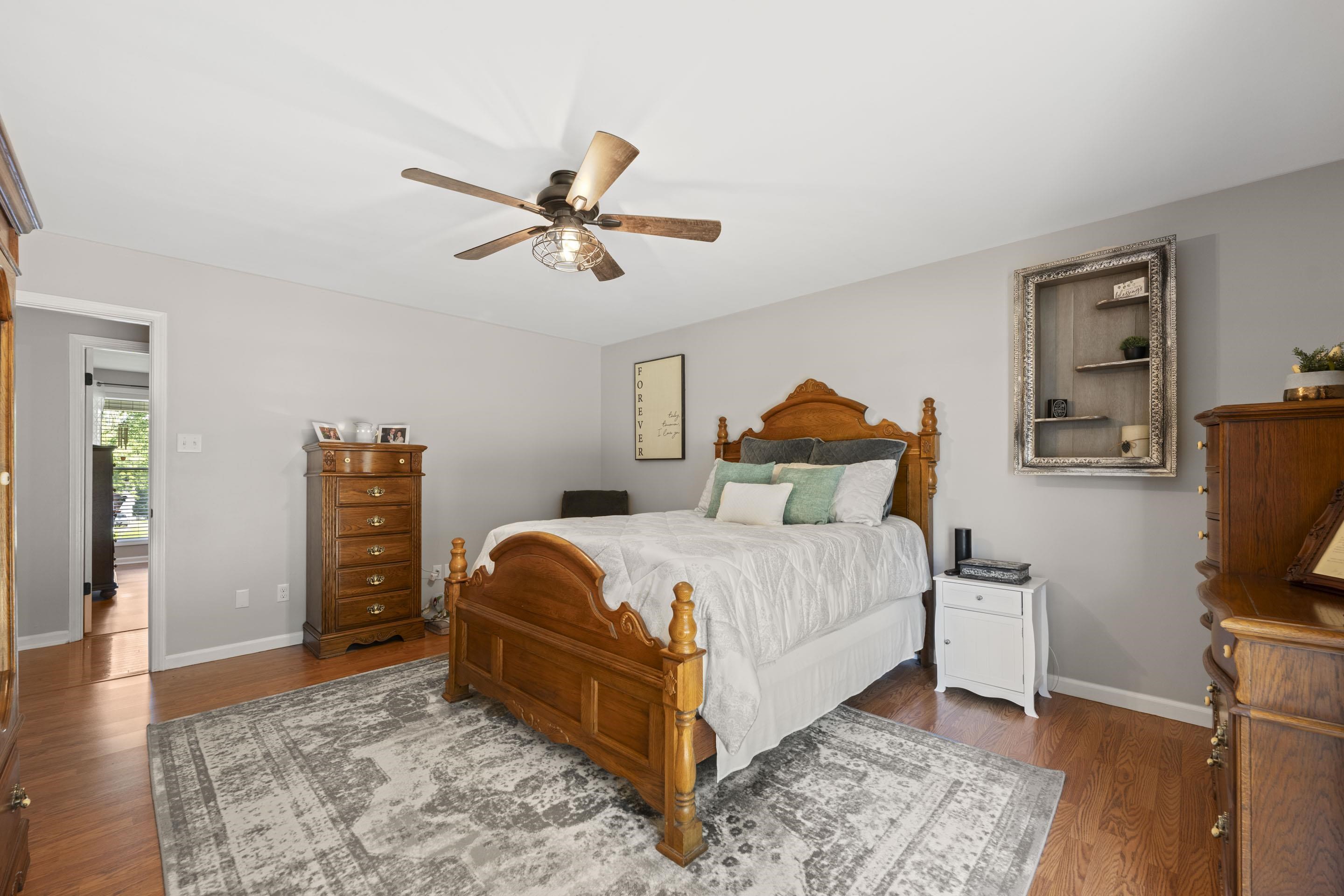 849 Belton Road Ripley, TN 38063 - Photo 20 of 40 a bedroom with bed and wooden floor