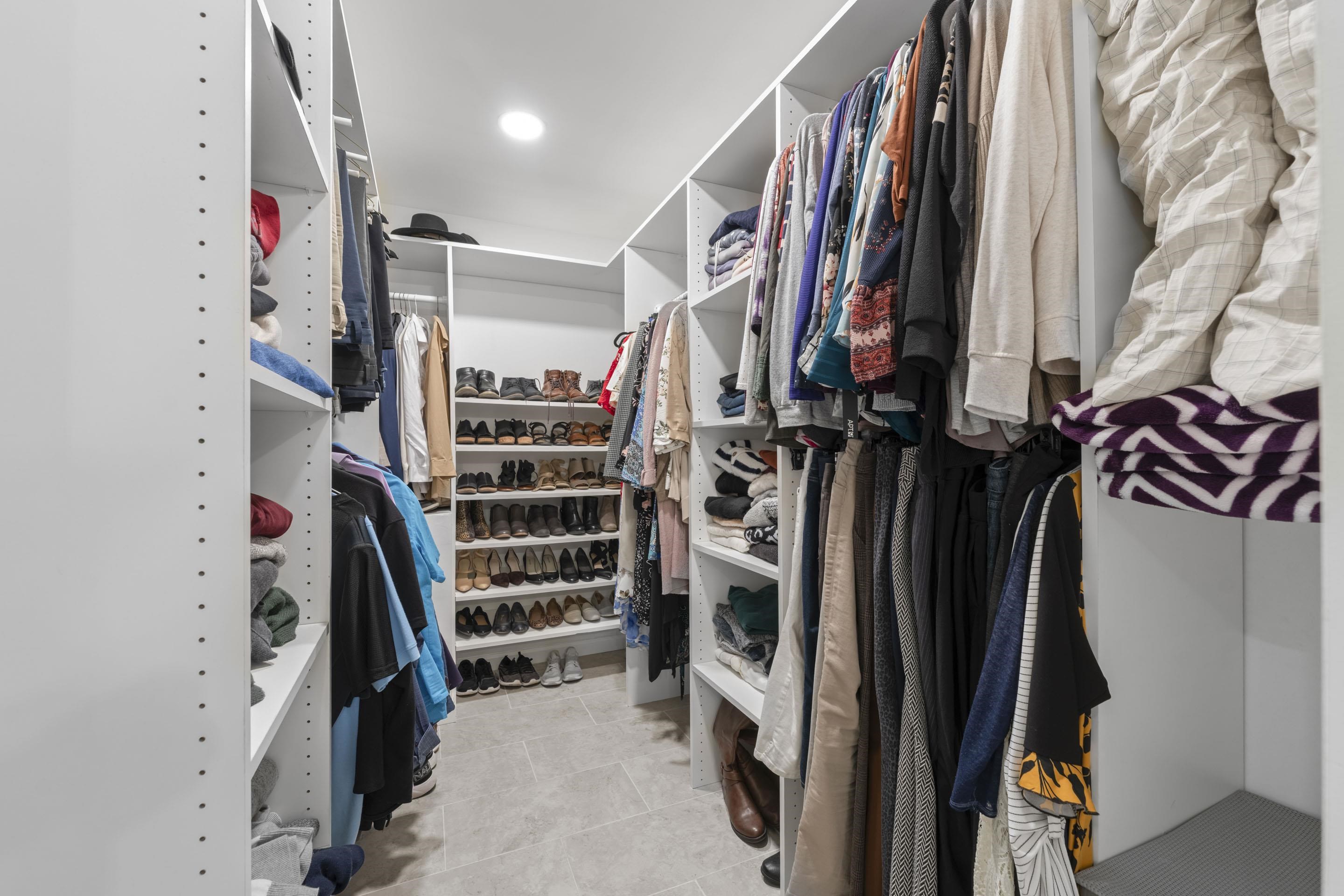 849 Belton Road Ripley, TN 38063 - Photo 23 of 40 a view of walk in closet with clothes and shoes