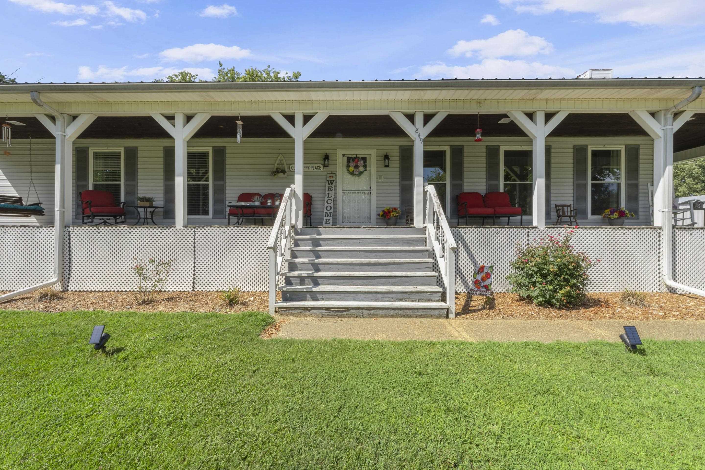 849 Belton Road Ripley, TN 38063 - Photo 30 of 40 a view of a house with a porch