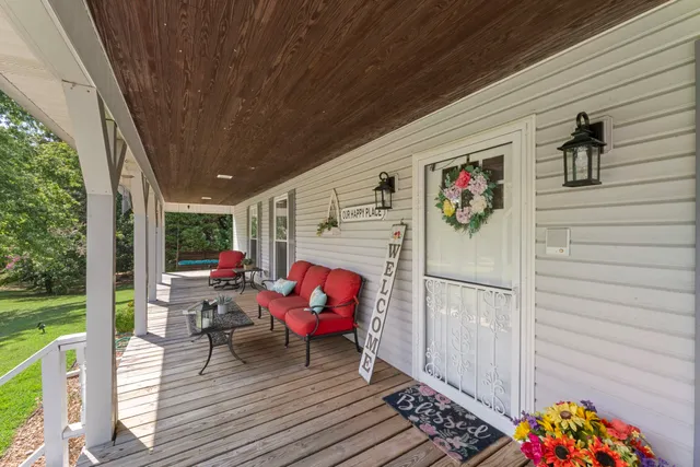 a backyard of a house with seating space