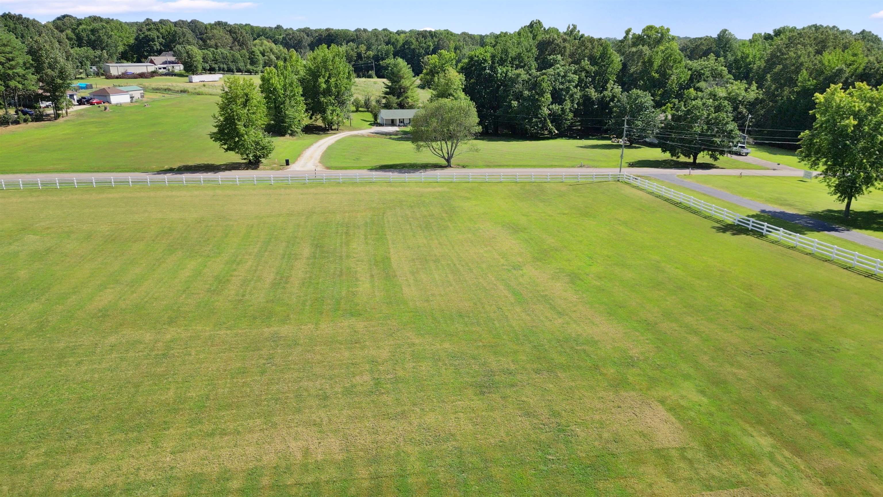 849 Belton Road Ripley, TN 38063 - Photo 40 of 40 a view of a lake with a yard