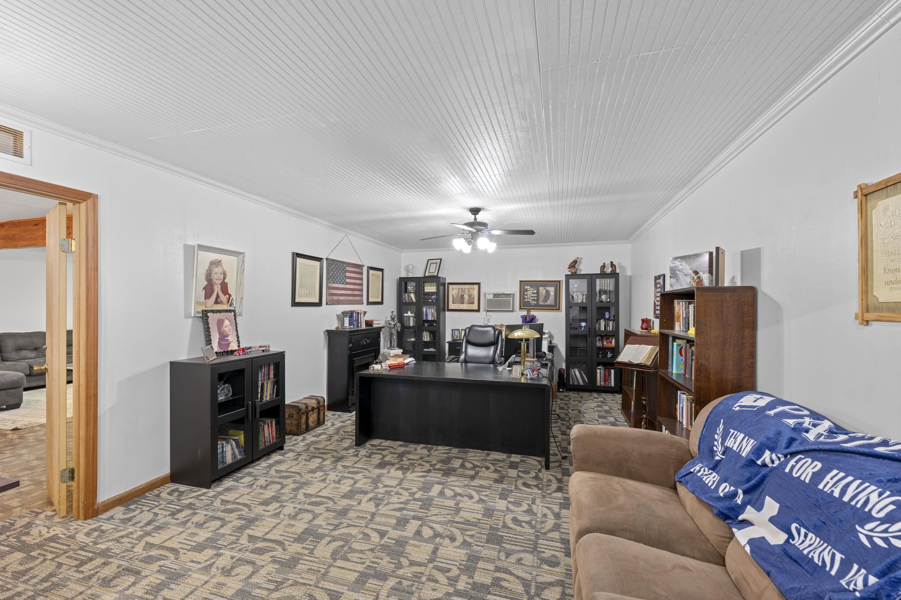 849 Belton Road Ripley, TN 38063 - Photo 9 of 40 a living room with furniture and a flat screen tv