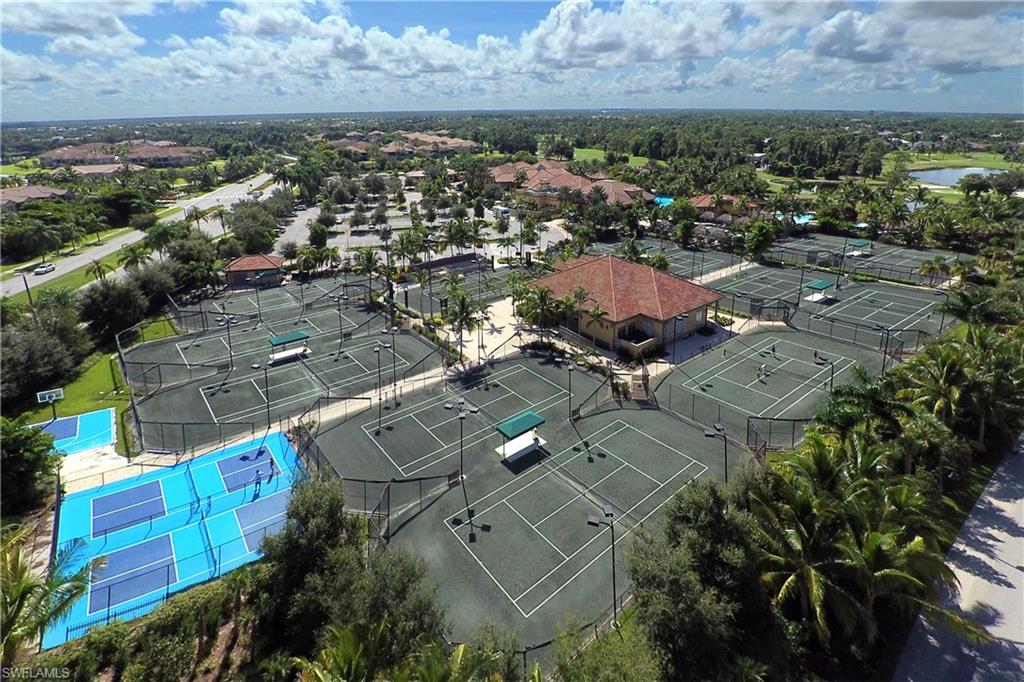 7417 Moorgate Point Way Naples, FL 34113 - Photo 23 of 26 Players Club 13 Har Tru tennis courts; 2 pickleball and 1/2 baskerball courts