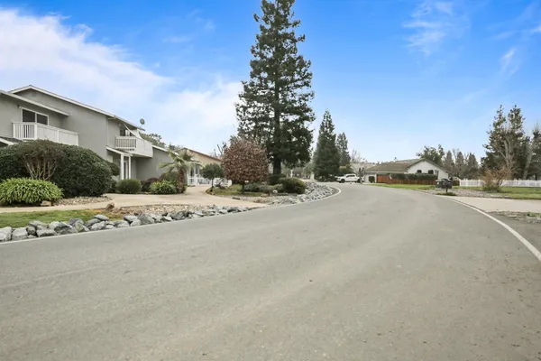 a view of street with houses