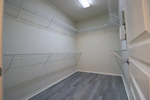 a view of a room with racks on the wall