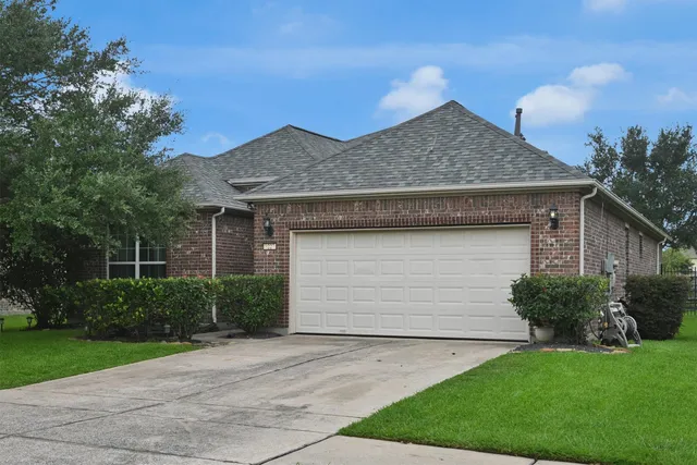 a house view with a garden space
