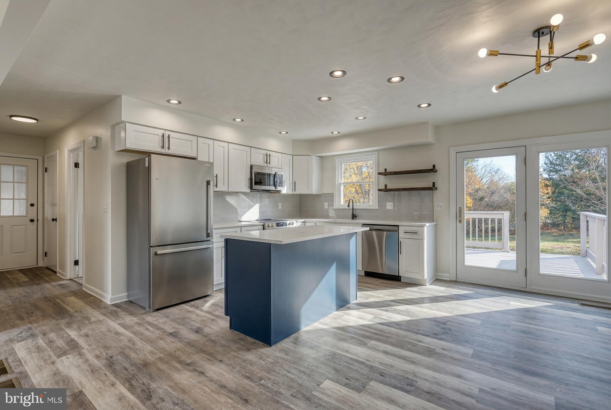 79 North School House Road Thomasville, PA 17364 - Photo 15 of 73 a kitchen with stainless steel appliances granite countertop a refrigerator and a sink