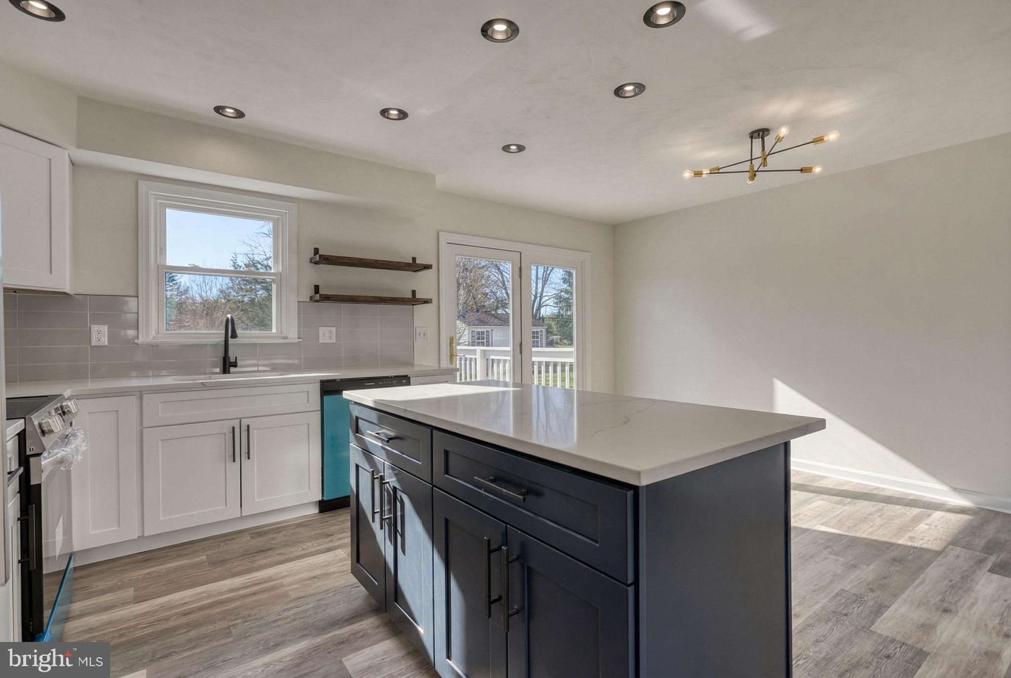 79 North School House Road Thomasville, PA 17364 - Photo 16 of 73 a kitchen with a sink stove and cabinets