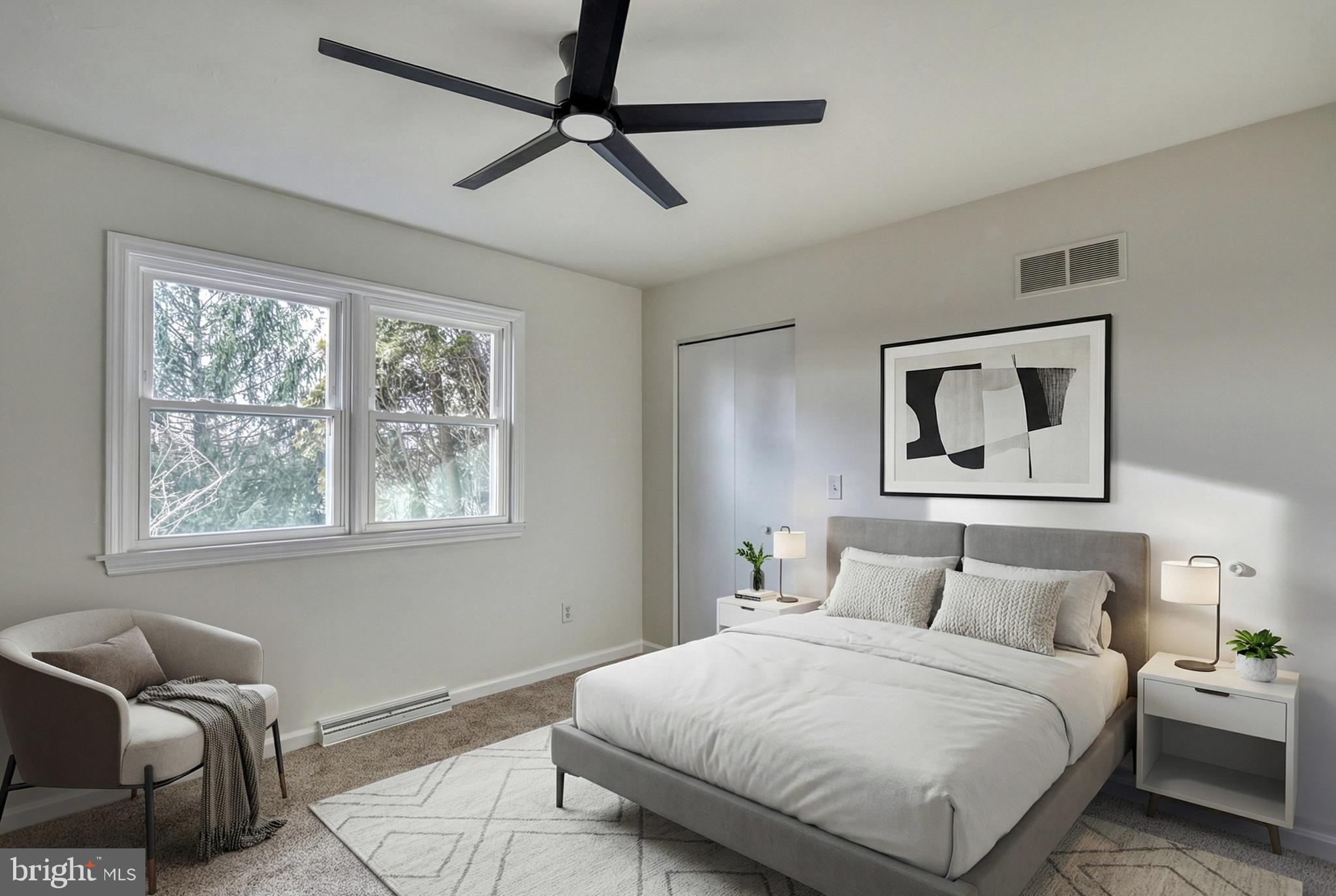 79 North School House Road Thomasville, PA 17364 - Photo 31 of 73 a bedroom with a bed and wooden floor