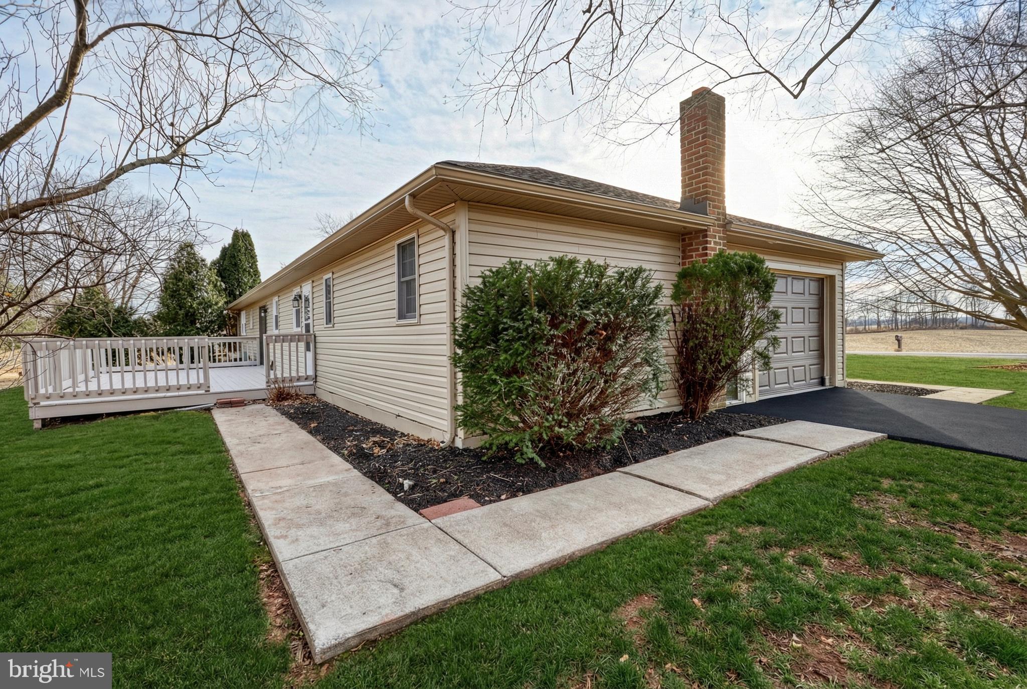 79 North School House Road Thomasville, PA 17364 - Photo 56 of 73 a front view of a house with garden