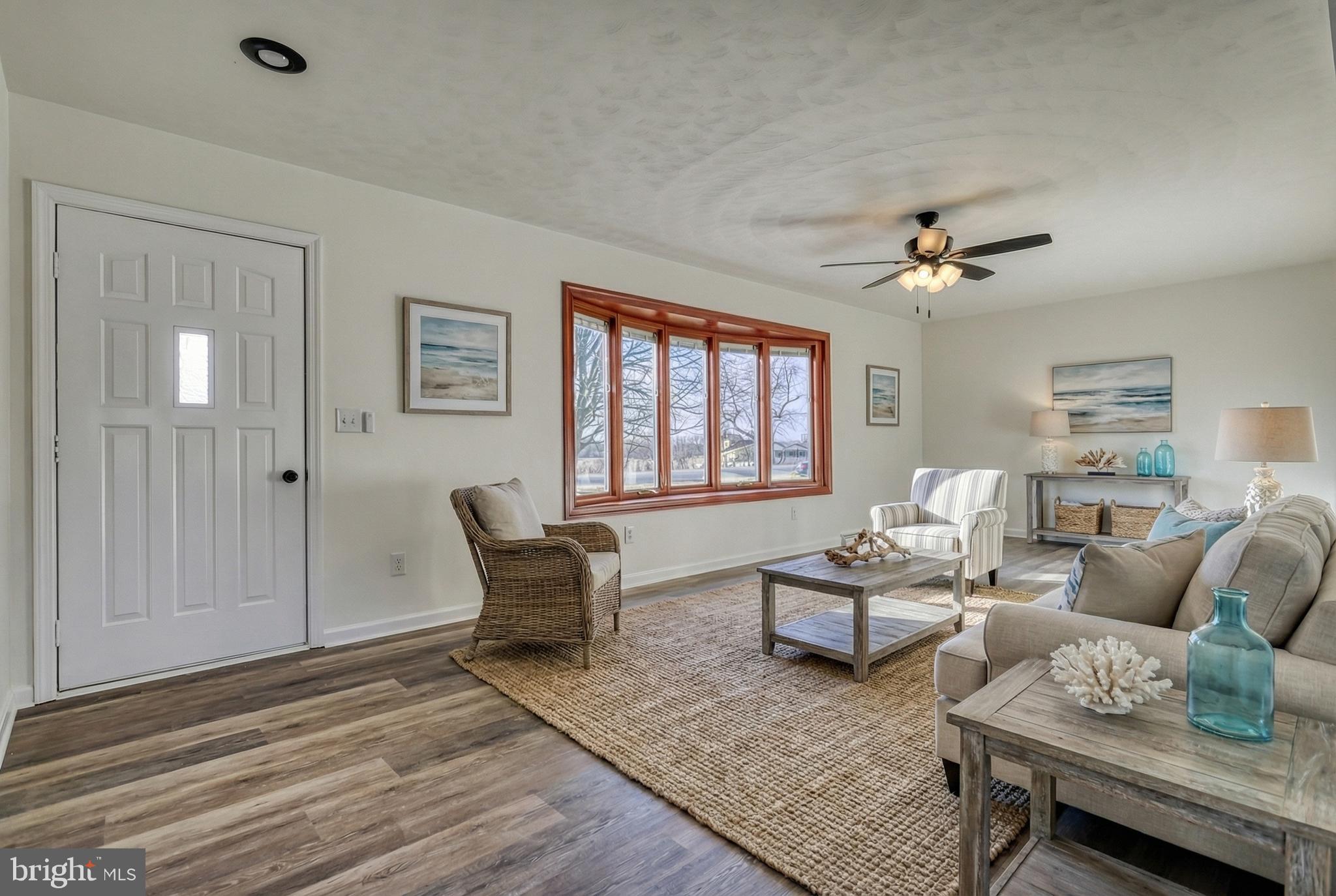 79 North School House Road Thomasville, PA 17364 - Photo 9 of 73 a living room with furniture and wooden floor