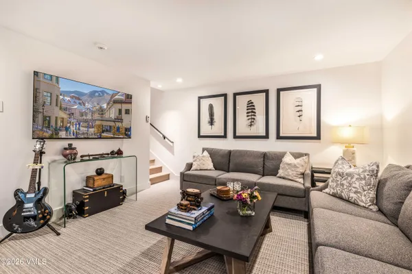 a living room with furniture and a couch