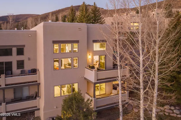 a view of residential houses with outdoor space