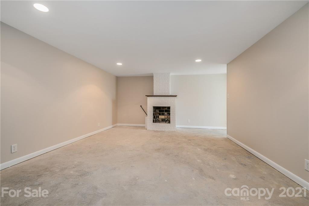 285 Tanner Street Rutherfordton, NC 28139 - Photo 22 of 39 a view of empty room with a fireplace